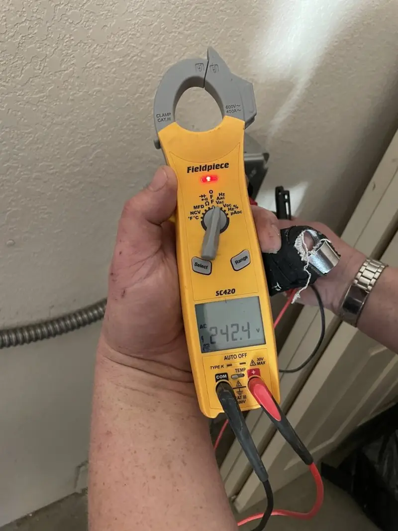 Voltage testing with clamp meter during Circuit Breaker Repair in Osage Beach